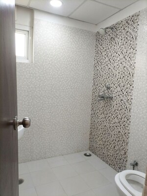 Bathroom in 2.5 BHK Apartment at Tulsiani Urban Woods, Sushant Golf City – for Rent