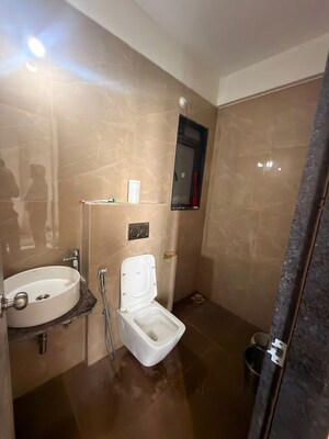 Bathroom in 2 BHK Apartment at Dhamji Shamji Mahavir Spring Tulip Phase 1, Pokhran Road No Two – for Rent