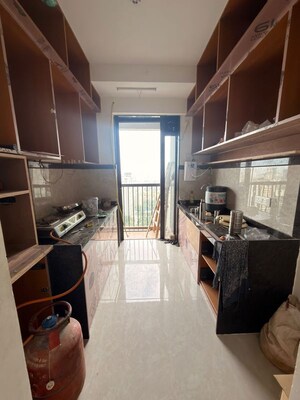 Kitchen in 2 BHK Apartment at Dhamji Shamji Mahavir Spring Tulip Phase 1, Pokhran Road No Two – for Rent
