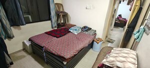 Bedroom in 2 BHK Apartment at Unnati Woods CHS, Kasarvadavali – for Sale