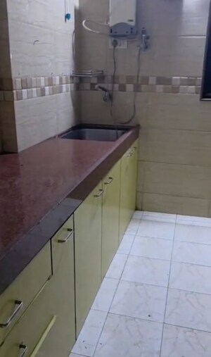 Kitchen in 1 BHK Apartment at Rajnigandha CHS Vasant Vihar, Vasant Vihar – for Rent