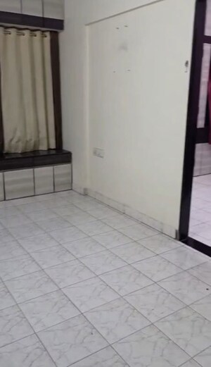 Room in 1 BHK Apartment at Rajnigandha CHS Vasant Vihar, Vasant Vihar – for Rent