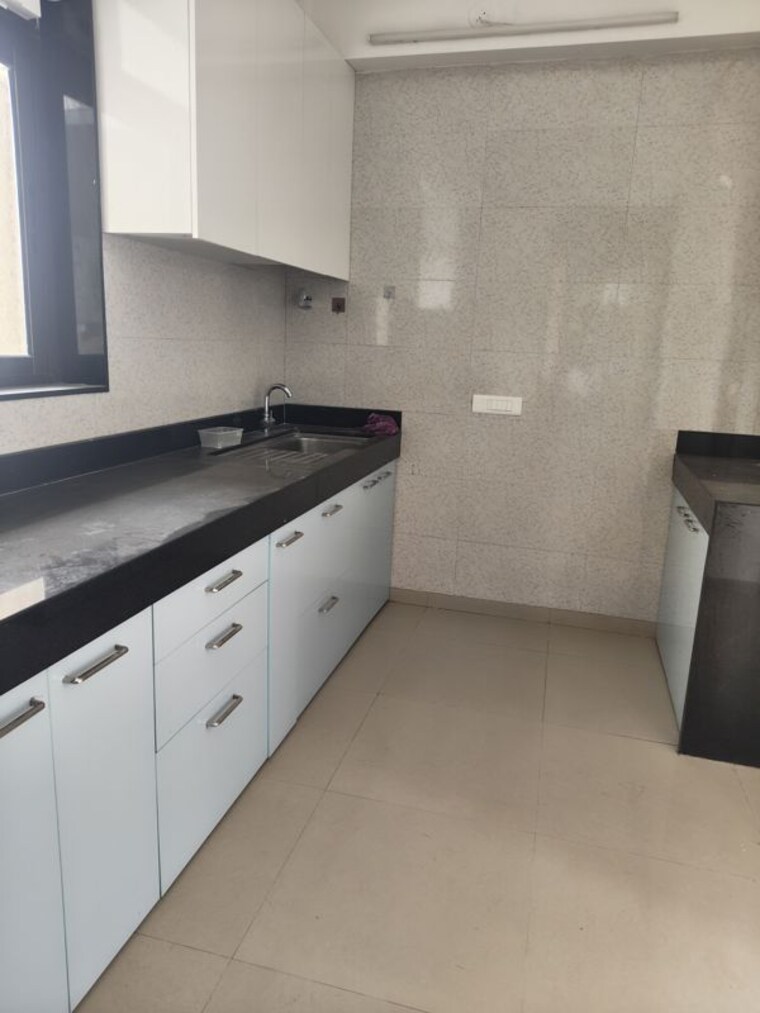 Kitchen, celestia-spaces 2 Bedroom 1150 Sq.Ft. Apartment In Parel Mumbai 10599423