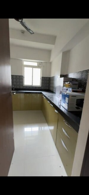 Kitchen in 2 BHK Apartment at Lodha Amara, Kolshet Road – for Sale