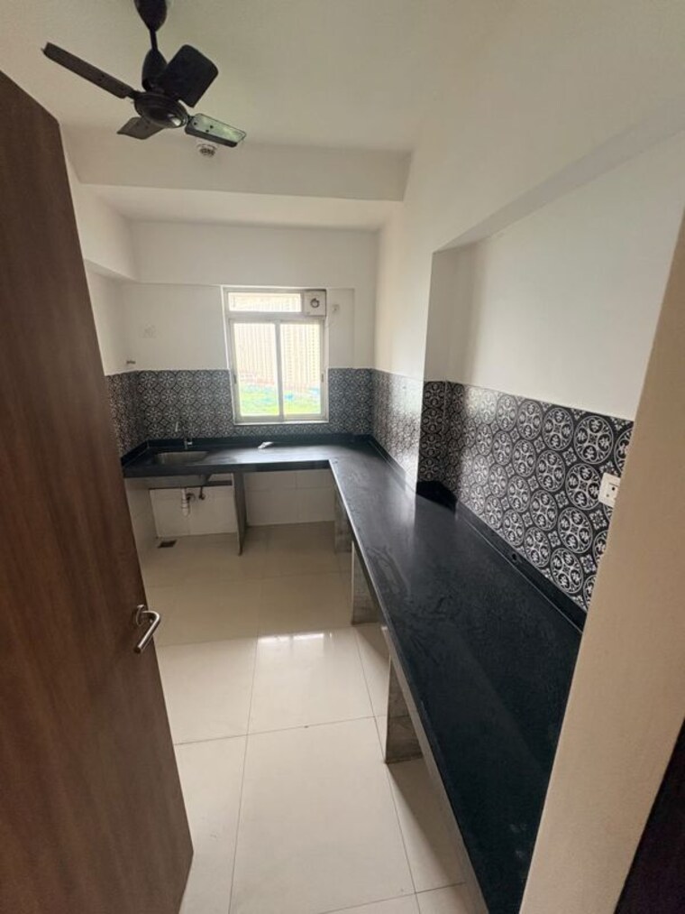 Kitchen, lodha-amara 2 Bedroom 735 Sq.Ft. Apartment In Kolshet Road Thane 10599469