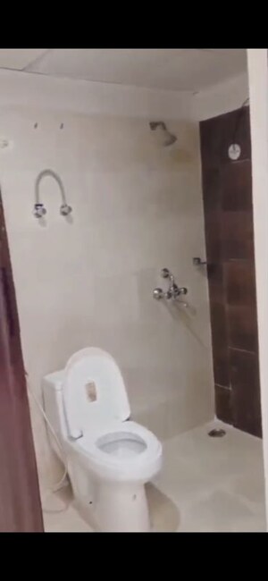 Bathroom in 1 BHK Apartment at Raj Nagar – for Sale