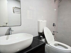 Bathroom in 3 BHK Apartment at Godrej Green Glades, Jagatpur – for Rent