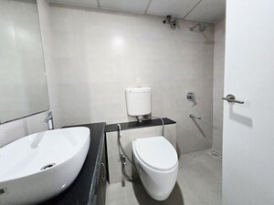 Bathroom in 3 BHK Apartment at Godrej Green Glades, Jagatpur – for Rent