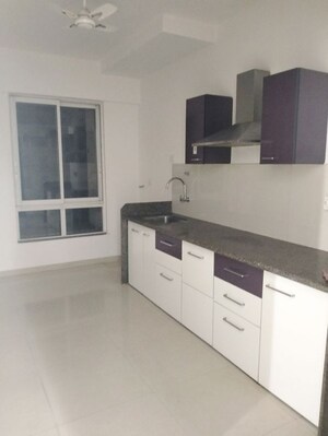Kitchen in 2 BHK Apartment at Puranik Rumah Bali, Ghodbunder Road – for Sale