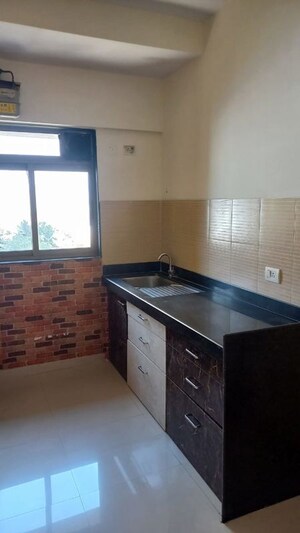 Kitchen in 2.5 BHK Apartment at Lodha Splendora, Ghodbunder Road – for Sale