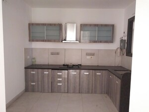 Kitchen in 3 BHK Apartment at Gera Emerald City, Kharadi – for Sale
