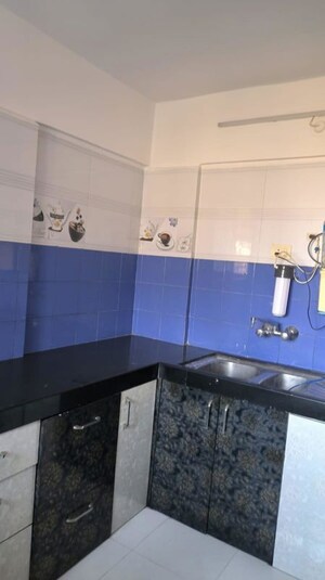 Kitchen in 3 BHK Apartment at Gera Emerald City, Kharadi – for Sale