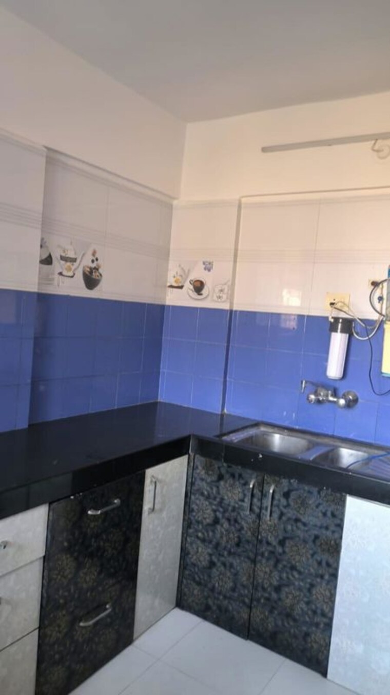 Kitchen, gera-emerald-city 3 Bedroom 1680 Sq.Ft. Apartment In Kharadi Pune 10599647