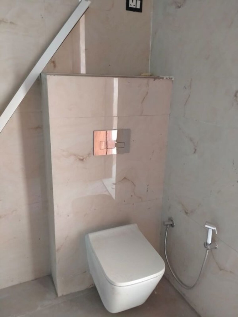 Bathroom, unnati-fortune-the-aranya 2.5 Bedroom 1280 Sq.Ft. Apartment In Sector 119 Noida 10599765