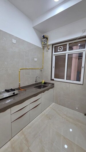 Kitchen in 2 BHK Apartment at Adarsh Nagar CHS Worli, Worli – for Rent