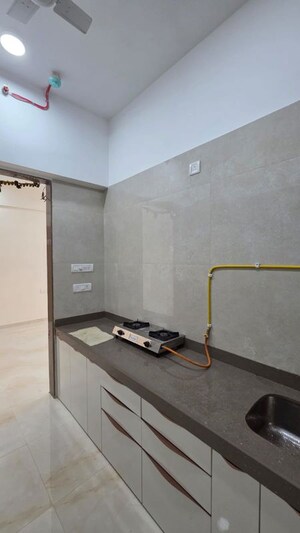 Kitchen in 2 BHK Apartment at Adarsh Nagar CHS Worli, Worli – for Rent