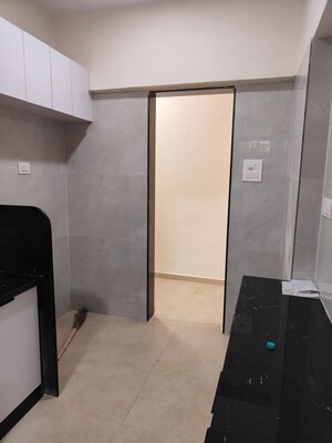 Team Area in 2 BHK Apartment at Sterling CHS, Andheri West – for Rent