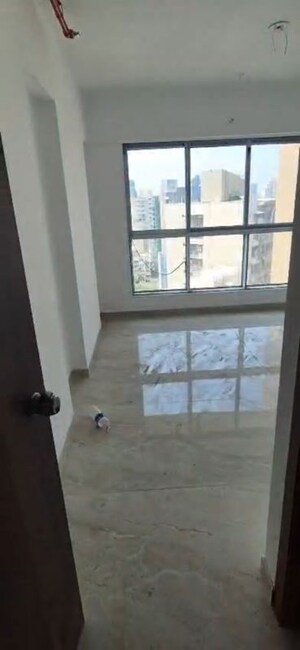 Bedroom in 3 BHK Apartment at Infinity Paradise CHS, Goregaon West – for Rent