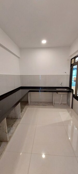 Kitchen in 2 BHK Apartment at DGS Sheetal Ekta, Malad East – for Rent