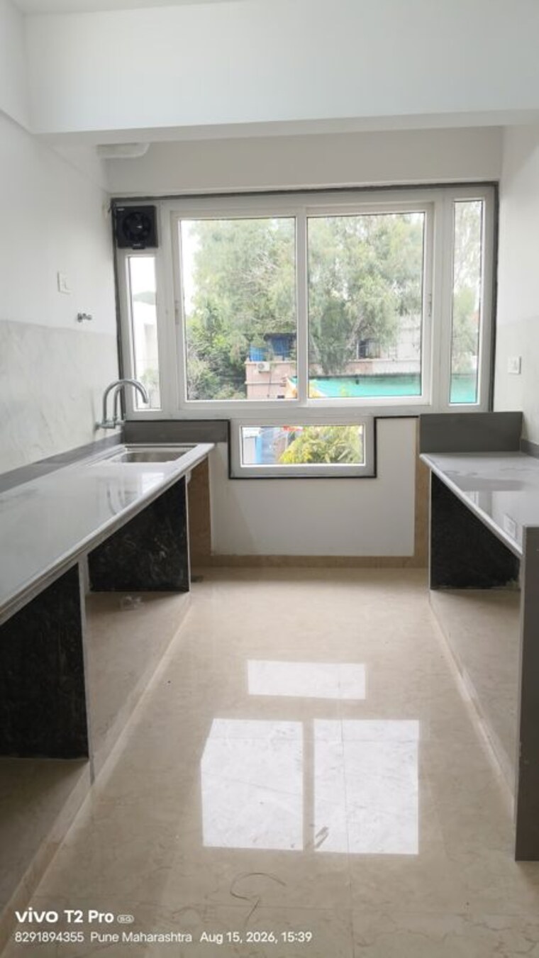 Kitchen, northcape-venicia 2 Bedroom 1200 Sq.Ft. Apartment In Baner Pune 10599921