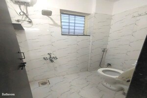 Bathroom in 1 BHK Apartment at Parashar CHS, Kharadi – for Rent
