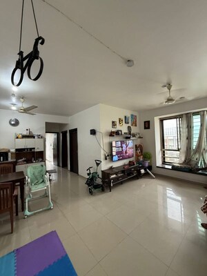 Living Room in 2 BHK Apartment at Rustomjee Elanza, Malad West – for Rent