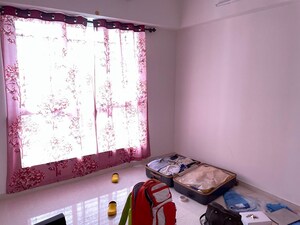 Bedroom in 2 BHK Apartment at Lodha Amara, Kolshet Road – for Rent