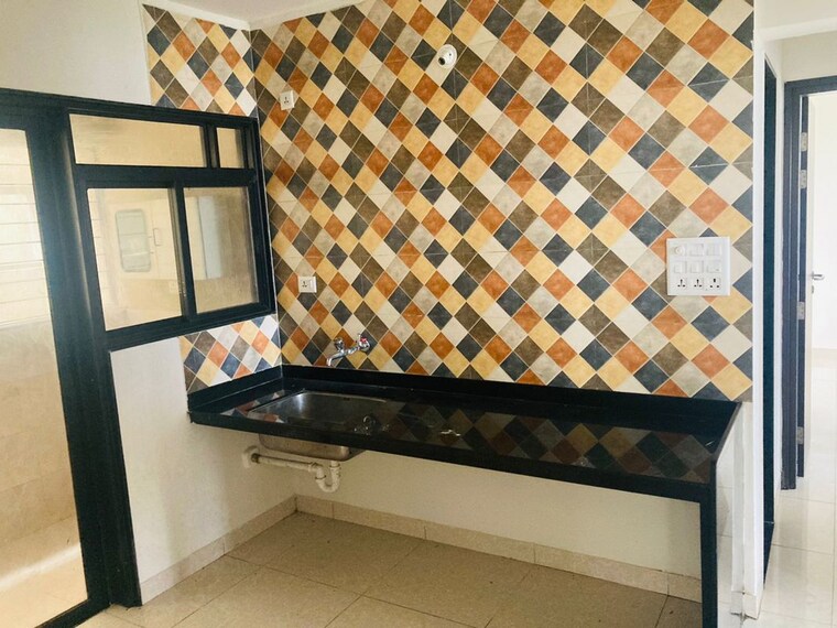 Kitchen, magarpatta-nanded-city-sargam 2 Bedroom 1050 Sq.Ft. Apartment In Sinhagad Pune 10600077