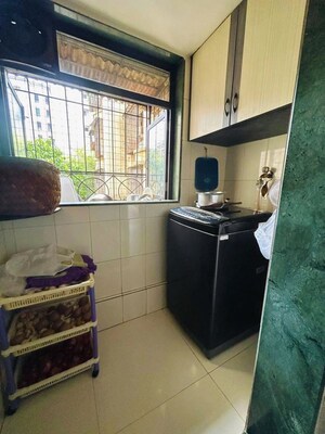 Kitchen in 2 BHK Apartment at Indravati Apartment, Dahisar East – for Sale
