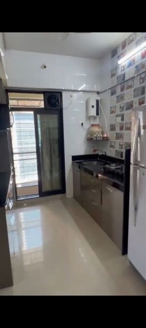 Kitchen in 2 BHK Apartment at Haware Estate, Kasarvadavali – for Rent