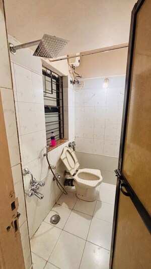 Bathroom in 1 BHK Apartment at Pinewood Apartment, Mulund West – for Sale