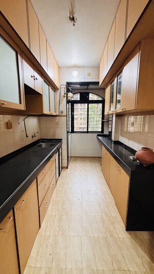 Kitchen in 1 BHK Apartment at Pinewood Apartment, Mulund West – for Sale