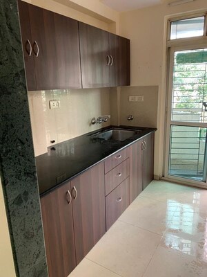 Kitchen in 1 BHK Apartment at Hiranandani Estate Riviera, Ghodbunder Road – for Rent