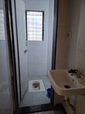 Bathroom in 2 BHK Apartment at Pranayraj Plaza, Dhanori – for Rent
