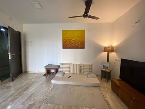 Living Room in 2 BHK Apartment at Hiranandani Woodpark Apartment, Ghodbunder Road – for Sale