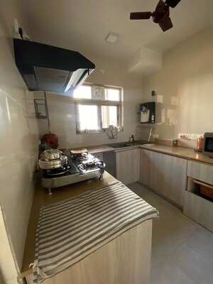 Kitchen in 2 BHK Apartment at Hiranandani Woodpark Apartment, Ghodbunder Road – for Sale