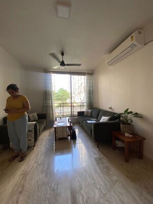 Living Room in 2 BHK Apartment at Hiranandani Woodpark Apartment, Ghodbunder Road – for Sale