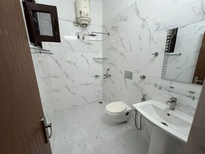 Bathroom in 2 BHK Apartment at Dhakoli – for Sale