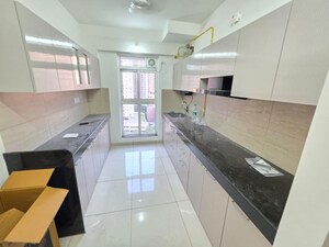 Kitchen in 3 BHK Apartment at Godrej Emerald, Ghodbunder Road – for Rent