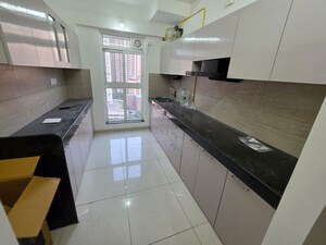 Kitchen in 3 BHK Apartment at Godrej Emerald, Ghodbunder Road – for Rent