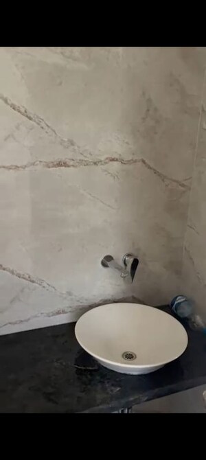 Bathroom in 2 BHK Apartment at Our Home CHS, Andheri West – for Sale