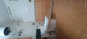 Bathroom in 3 BHK Apartment at Eros Woodbury Tower, Charmwood Village – for Rent