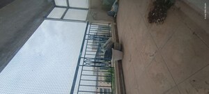 Balcony in 3 BHK Apartment at Eros Woodbury Tower, Charmwood Village – for Rent