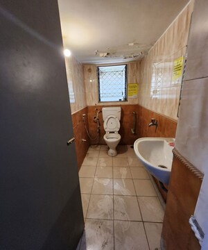 Bathroom in  Office Space at Veera Desai Industrial Estate – for Sale