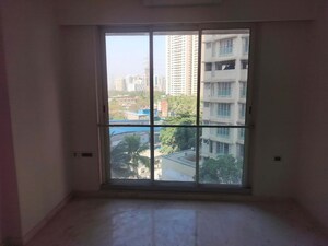 Room in 2 BHK Apartment at Ekta Tripolis, Goregaon West – for Rent