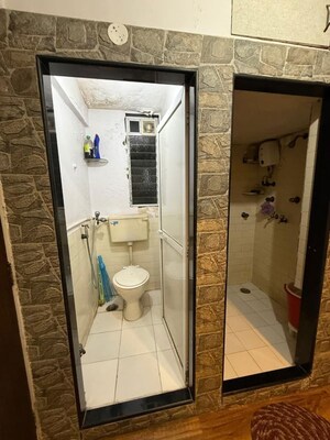 Bathroom in 2 BHK Apartment at Kingston Classic, Malad West – for Rent