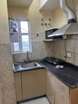 Kitchen in 1 RK Apartment at Supertech Ecociti, Sector 137 – for Rent