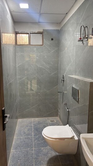 Bathroom in 2 BHK Builder Floor at Kingson Green Villa Phase 2, Panchsheel Green – for Sale