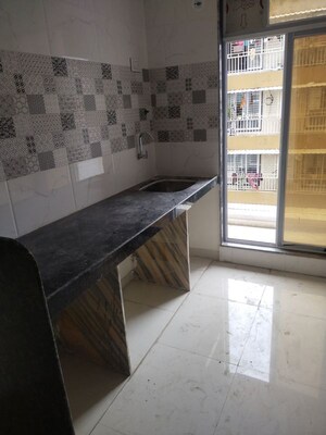 Kitchen in 1 BHK Apartment at Mahashakti Zenisha Corner, Vadghar – for Sale