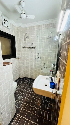 Bathroom in 3 BHK Builder Floor at Panchsheel Enclave – for Rent